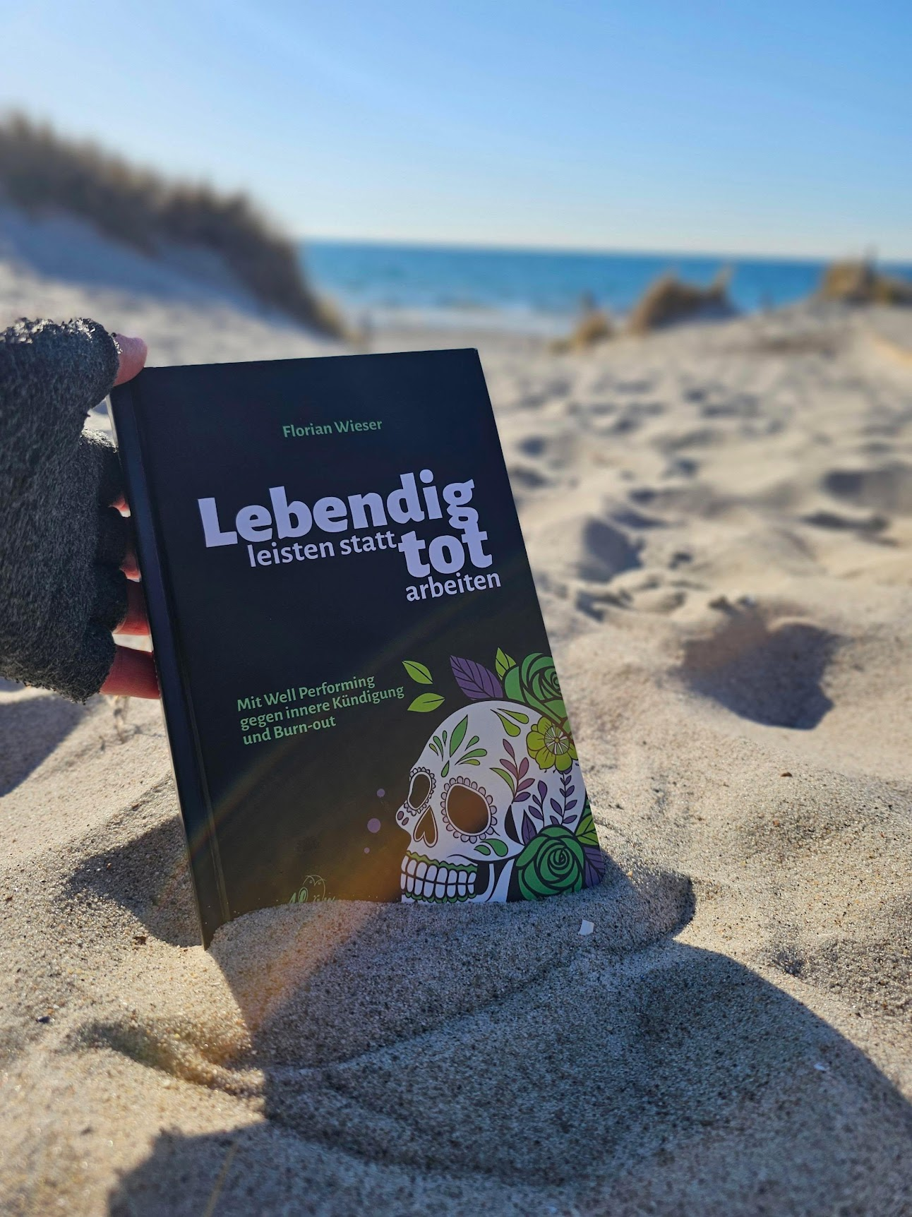 Buch am Strand